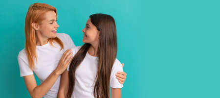 Mother and daughter child banner, copy space, isolated background. express emotions. happy mother...