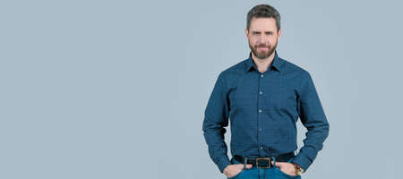 Clothes that you need in your wardrobe. Bearded man wear shirt with jeans. Clothes that matter. Man face portrait, banner with copy space.の写真素材