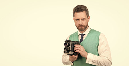 male photographer taking pictures. smiling man photographing.