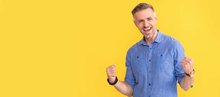Man face portrait, banner with copy space. happy successful man. guy with hand watch. man showing...