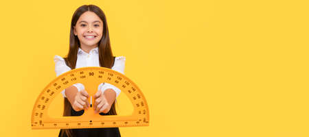 cheerful kid in school uniform hold mathematics protractor for measuring, high school. Banner of...