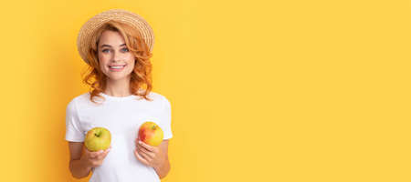 Summer girl hold apple. Woman isolated face portrait, banner with mock up copy space. diet and skin beauty. dental care. lunch break. detox. happy young girl with apple fruit.の写真素材