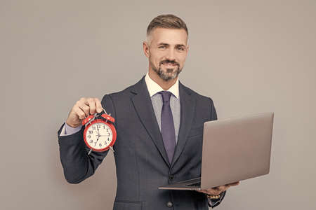 deadline. time. mature businessman working online. business success. time management.の写真素材