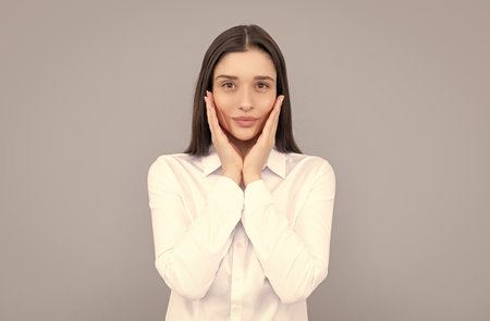 skincare concept. cute businesswoman in white shirt. business success.
