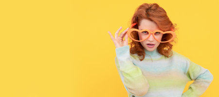 Girl with funny party glasses. Woman isolated face portrait, banner with copy space. let me see. girl wear glasses. birthday party celebration. express positivity. positive emotions.の写真素材