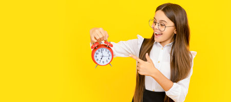 surprised kid in school uniform and glasses point finger on alarm clock showing time, shopping time....