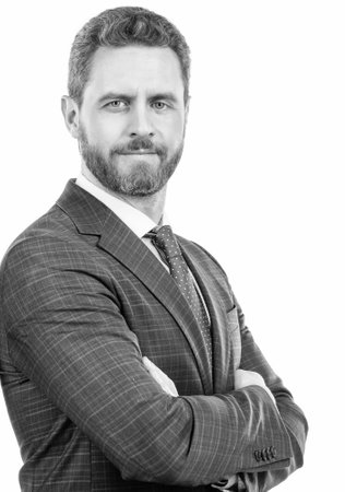 Serious confident professional employee man keep arms crossed in formal suit, confidenceの写真素材