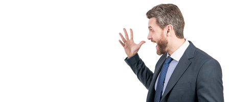 Fury boss man in formal suit yell gesticulating half-turn isolated on white copy space, yelling. Man face portrait, banner with copy space. Business man in suit, isolated studio background.の写真素材