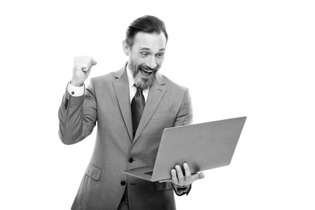 happy grizzled entrepreneur use wireless computer work online isolated on white, internet access.