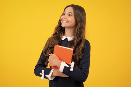 Teenager school girl study with books. Learning knowledge and kids education concept.の写真素材