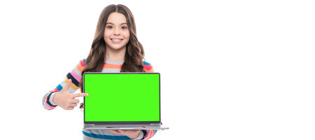 happy child study online education making presentation on computer copy space, pointing finger. School girl portrait with laptop, horizontal poster. Banner header with copy space.の写真素材