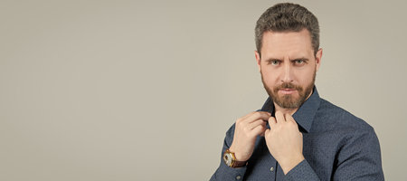 Look good every day. Fashion look of bearded man. Casual menswear. Mens clothing. Looking trendy. Man face portrait, banner with copy space.の写真素材