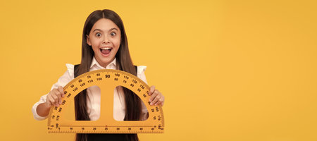 measuring and sizing. education for child. mathematics. amazed teen girl hold protractor. Portrait...