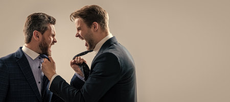 Man face portrait, banner with copy space. colleagues have disagreement and conflict. businessmen...