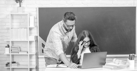 dad and daughter near clackboard. back to school. childhood education.の写真素材