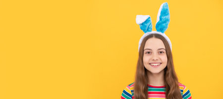 happy easter child girl in rabbit bunny ears smiling on holiday. Easter child horizontal poster. Web...