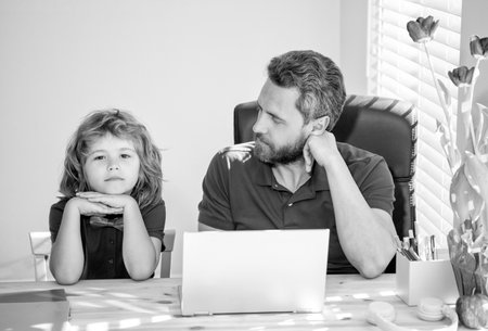 boy do homework with teacher. webinar video lesson. online education on laptop.の写真素材