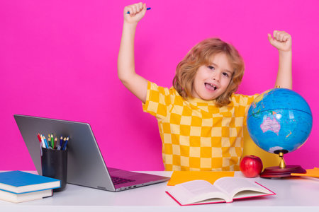 Excited pupil. Kid boy from elementary school with book. Smart caucasian school boy kid pupil going...