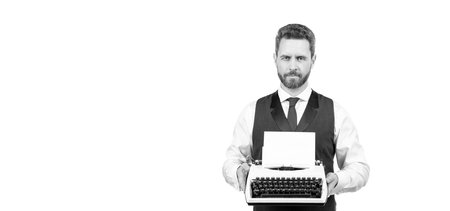 man typing on vintage typewriter. businessman with retro typewriter. typist author isolated on whiteの写真素材