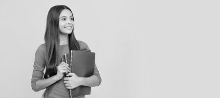 high school. back to school. teen girl ready for studying. childhood happiness. Banner of school girl student. Schoolgirl pupil portrait with copy space.の写真素材