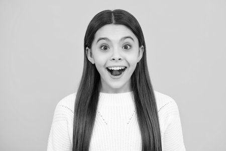 Childrens day. Excited kids face. Amazed expression, cheerful and glad.の写真素材