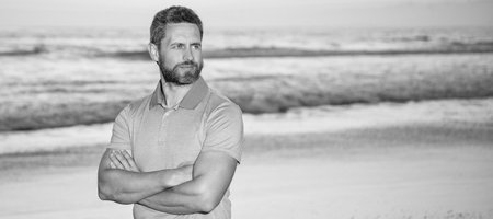 Man face portrait, banner with copy space. guy over the sea on sunrise summer beach, copy space, seascape.の写真素材