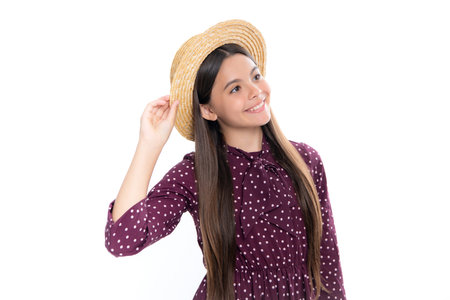 Portrait of happy smiling teenage child girl. Emotional portrait of caucasian teenager child girl isolated on studio white background.の写真素材