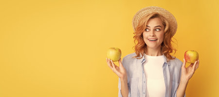 Woman isolated face portrait, banner with mock up copy space. natural organic fresh apple. healthy life. diet and skin beauty. dental care. lunch break. Summer female model with apple.の写真素材