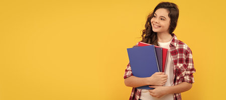 schoolgirl with notebook. back to school. teen girl ready to study. Banner of schoolgirl student. School child pupil portrait with copy space.の写真素材