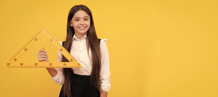 trigonometry stationery. measuring and sizing. education for child. mathematics. Banner of schoolgirl student. School child pupil portrait with copy space.の写真素材