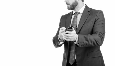 Professional man cropped view hold mobile phone isolated on white copy space, mobile callの写真素材