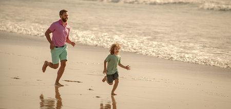 family travel weekend and vacation. fathers or family day. daddy with kid boy on summer day.の写真素材