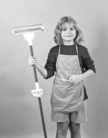 Child doing housework. Portrait of child cleaning, concept growth, development, family...