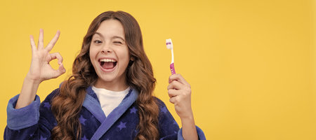 healthy beautiful smile. using best toothpaste. childrens stomatology. ok gesture. Banner of child...