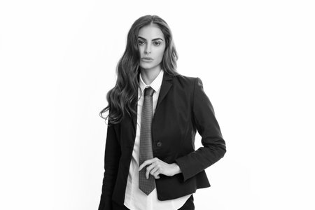 Female student, young teacher. Sexy sensual business woman portrait. Fashion businesswoman in suit isolated on white studio background. Business women vogue style.の写真素材