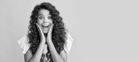 amazed teen girl with long curly hair and perfect skin. Child face, horizontal poster, teenager girl...