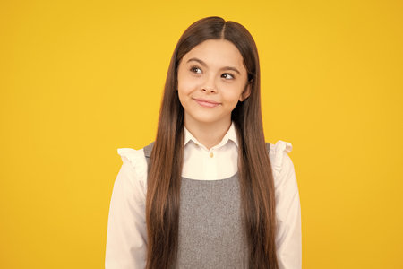 Little kid girl 12,13, 14 years old on isolated background. Children studio portrait. Emotional kids face.の写真素材