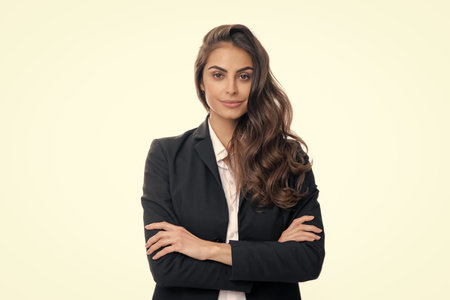 Portrait of business woman in suit crossed arms. Confidence businesswoman against grey background with copy space. Proud student girl. Beautiful businesswoman.の写真素材