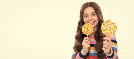 try this. caramel candy shop. childhood. teen dental care. sweet tooth. yummy. Teenager child with sweets, poster banner header, copy space.の写真素材
