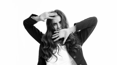 Woman crossed hands show no decline isolated over gray background. Displeased woman blocking offer, showing cross stop gesture, negative reply. Student, young teacher.の写真素材