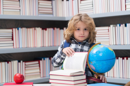 Little student school child. Portrait of nerd student with school supplies.