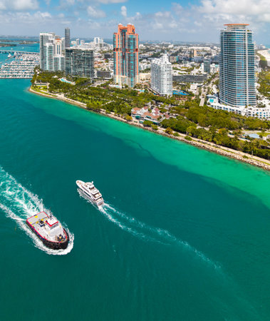 Aerial view of Miami Beach marina with turquoise waters. Drone shot of Miami skyline. Top view of South Miami Beach. Miami cityscape with luxury skyscrapers and ocean.の写真素材