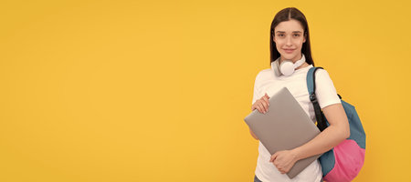cheerful lady in headphones hold pc carry backpack, school. Woman isolated face portrait, banner...