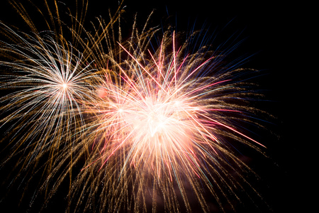 Fireworks lights in the black skyの写真素材