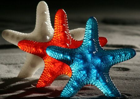 Red, White, and Blue Stars on Moon Surface