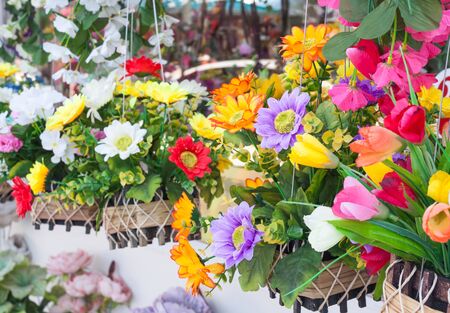 Colorful decoration artificial flowers,vintage effectの写真素材