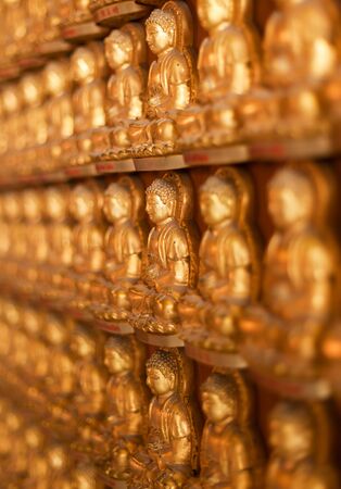 NONTHABURI THAILAND-JANUARY 24 : Three golden Buddhas statue at wat boromracha temple in nonthaburi.On JANUARY 24,2015 in Nonthaburi ,Thailand.のeditorial素材