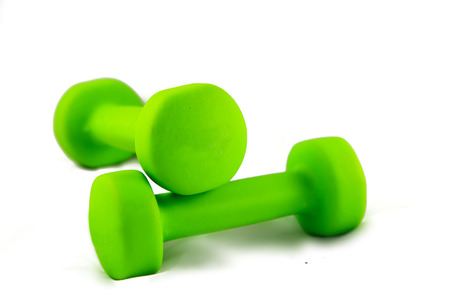 two green dumbbellsの写真素材