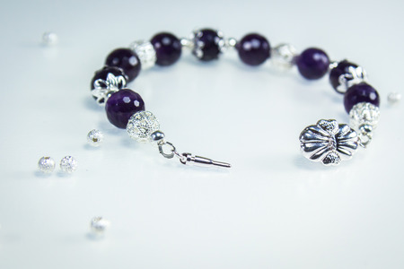 Bracelet with Amethyst beads and silver plated filigre beadsの写真素材