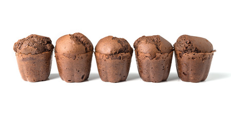 chocolate muffins with raisins isolated on white backgroundの写真素材
